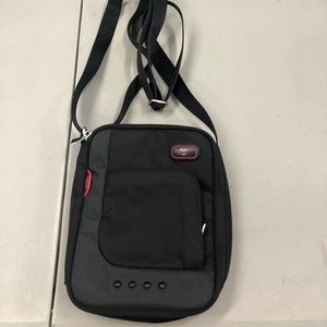 Tumi small travel bag.